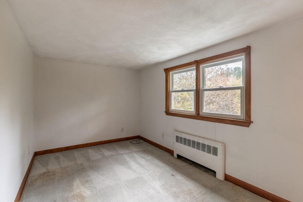 1 King Street Wakefield, MA 01880 - Photo 13 of 25 an empty room with a window