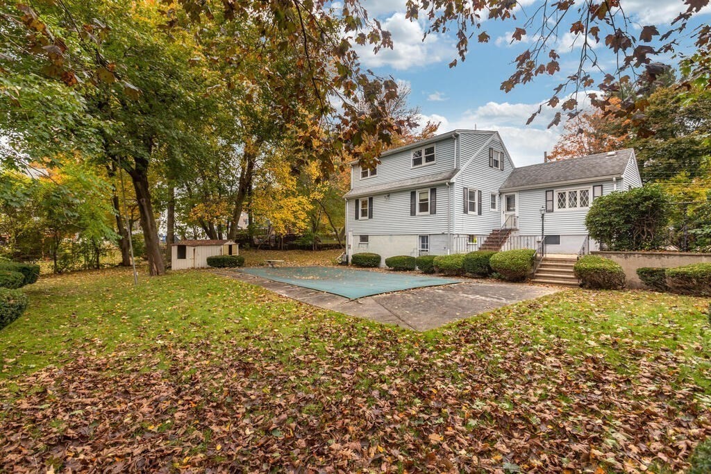 1 King Street Wakefield, MA 01880 - Photo 19 of 25 a front view of a house with a yard