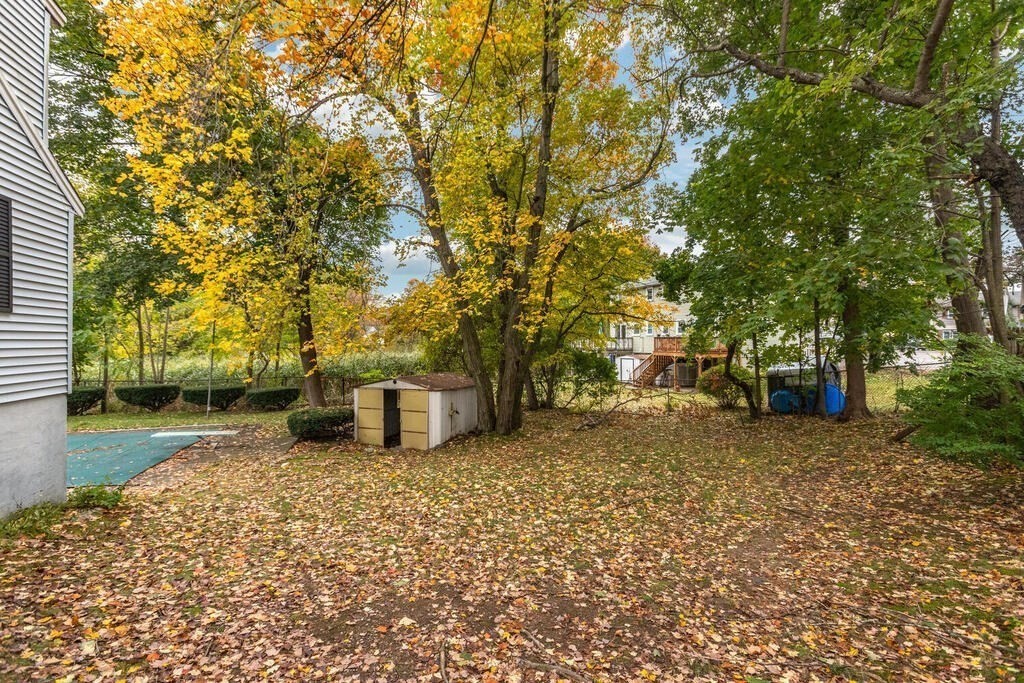 1 King Street Wakefield, MA 01880 - Photo 22 of 25 a backyard of a house with lots of green space