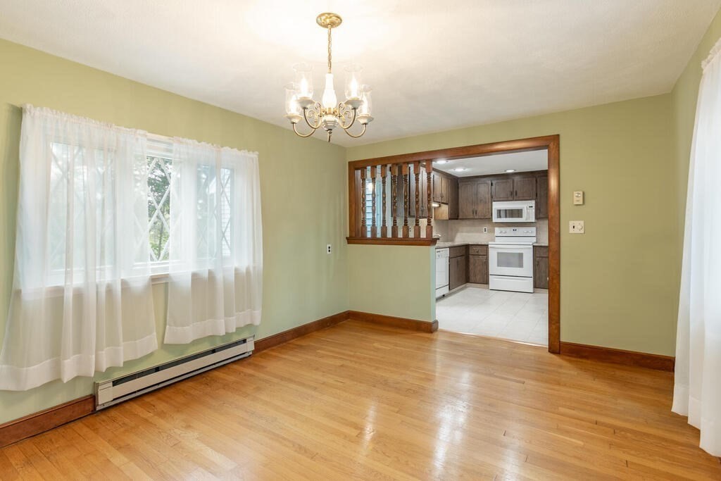 1 King Street Wakefield, MA 01880 - Photo 6 of 25 a view of an empty room with a window
