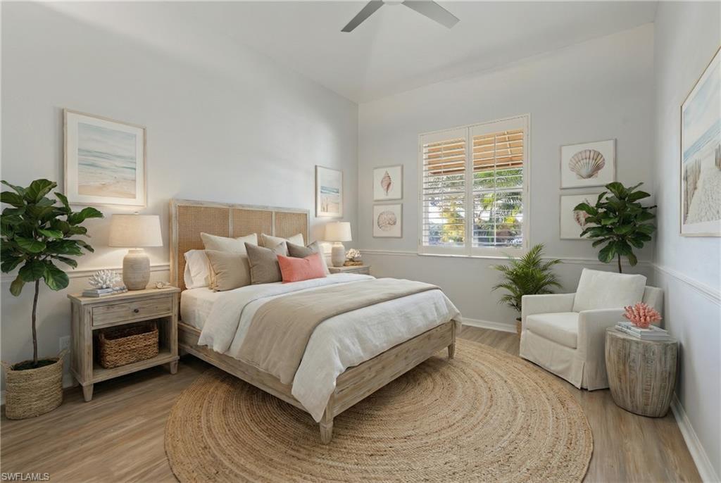 20751 Rivers Ford Estero, FL 33928 - Photo 12 of 36 Bedroom with a ceiling fan and light wood finished floors