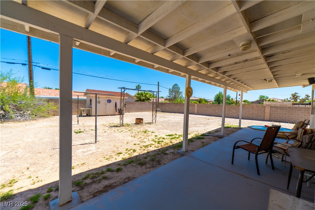 475 East Robindale Road Las Vegas, NV 89123 - Photo 21 of 41 Fenced backyard with a patio area