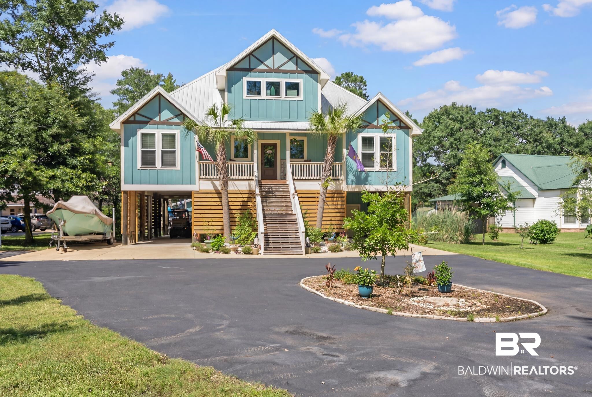 7266 Franklin Road Foley, AL 36535 - Photo 64 of 64 Raised coastal-style property featuring a light blue siding facade and white trim details