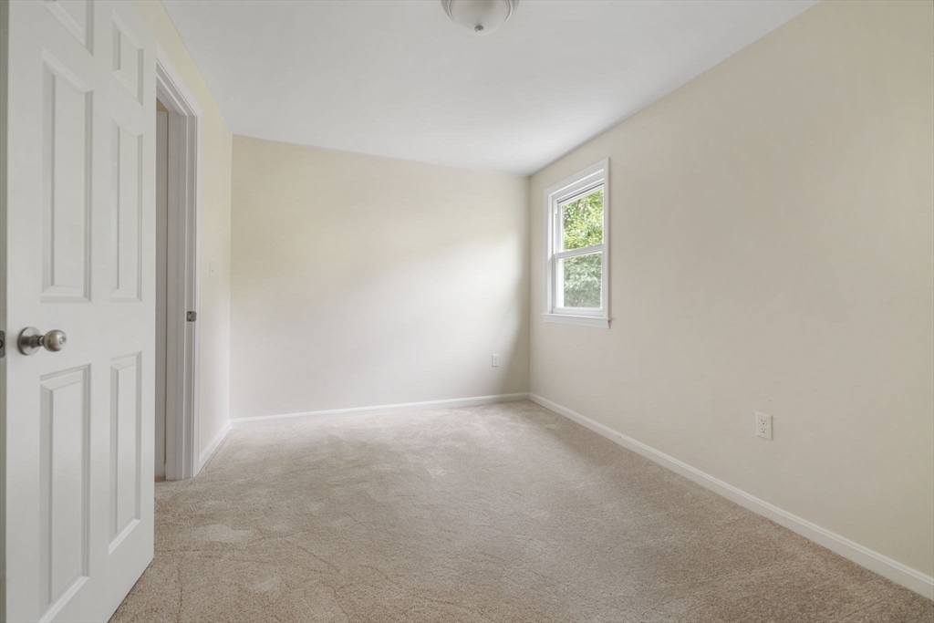 1030 Oak Street Dighton, MA 02764 - Photo 13 of 20 a view of an empty room with a window