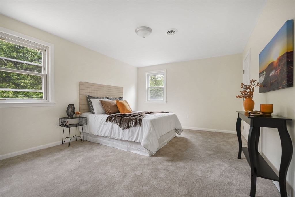 1030 Oak Street Dighton, MA 02764 - Photo 14 of 20 a bed room with furniture and a window