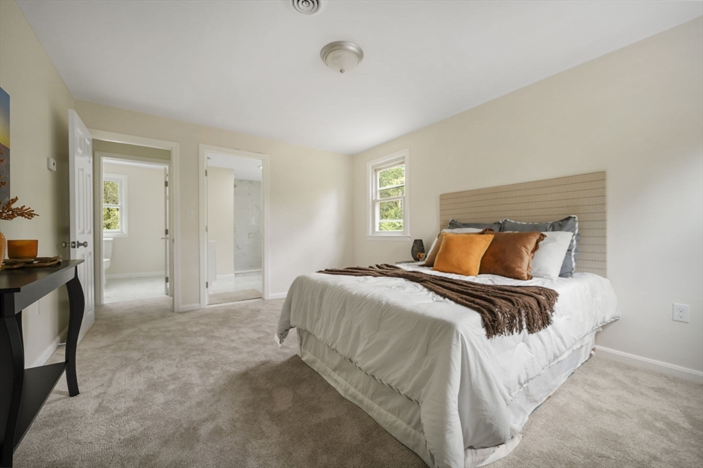 1030 Oak Street Dighton, MA 02764 - Photo 15 of 20 a bedroom with a bed and a tv