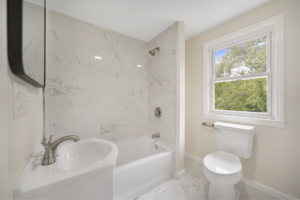 1030 Oak Street Dighton, MA 02764 - Photo 18 of 20 a bathroom with a sink toilet and bathtub