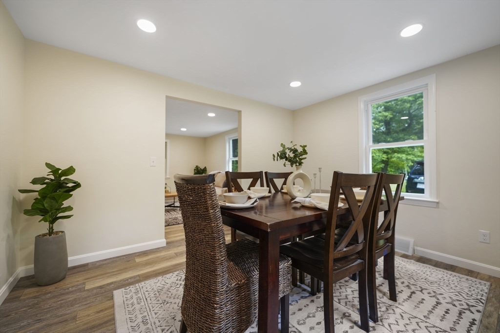 1030 Oak Street Dighton, MA 02764 - Photo 6 of 20 a view of a dining room with furniture window and wooden floor