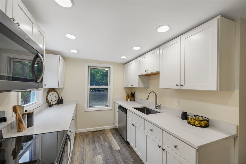 1030 Oak Street Dighton, MA 02764 - Photo 9 of 20 a kitchen with a sink appliances and cabinets