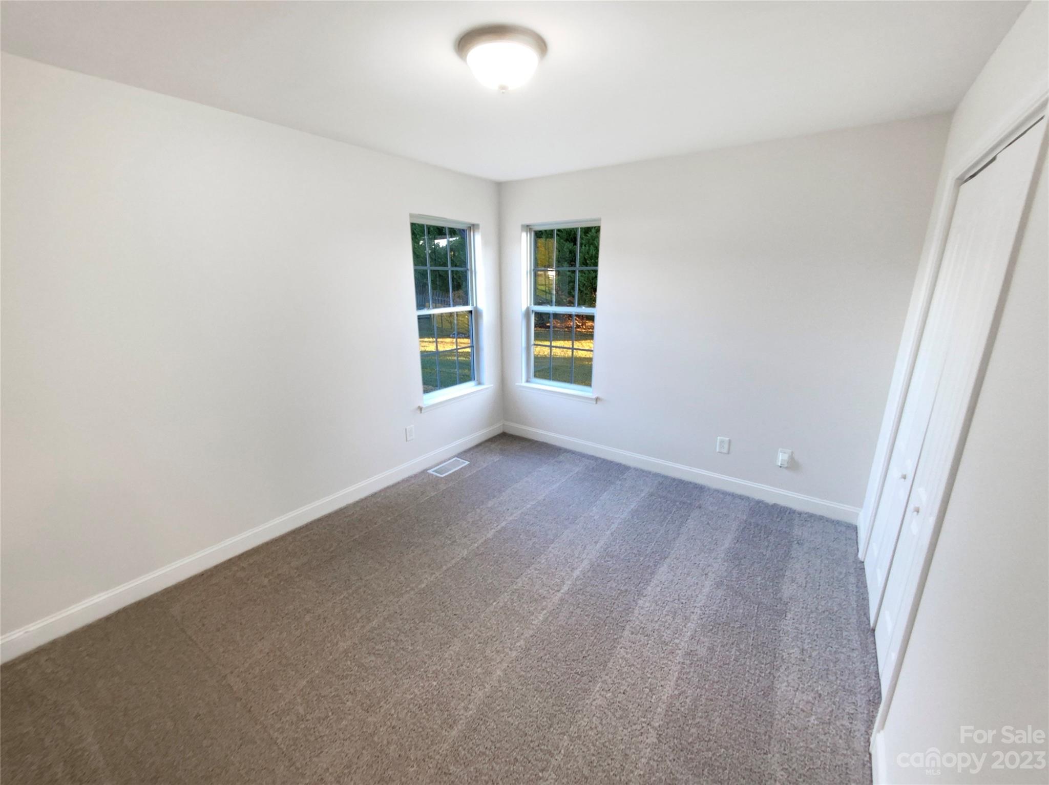 2900 Ruben Road Monroe, NC 28112 - Photo 11 of 21 an empty room with windows
