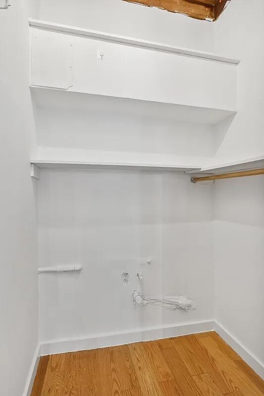 105 West 77th Street, Unit 3F Manhattan, NY 10024 - Photo 10 of 12 a view of small space with racks on the wall