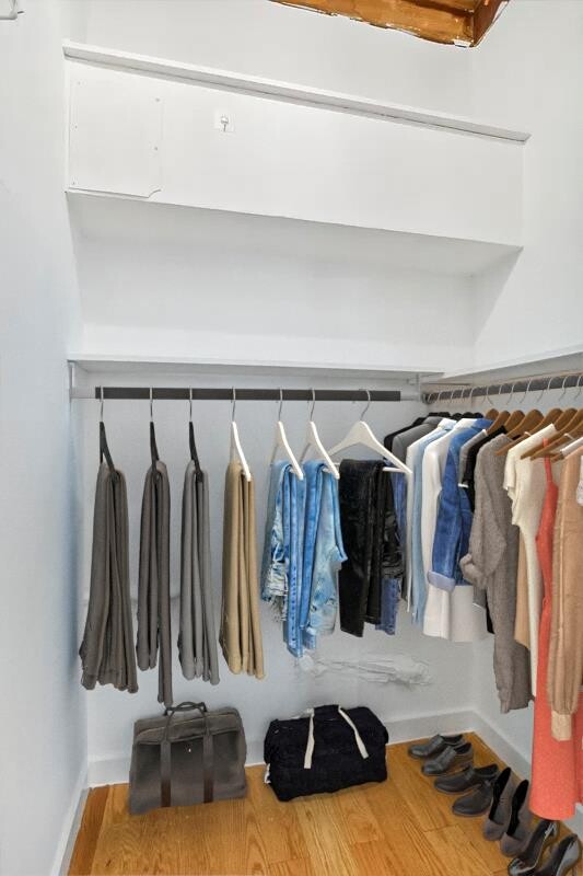 105 West 77th Street, Unit 3F Manhattan, NY 10024 - Photo 4 of 12 a view of walk in closet with clothes and shoes