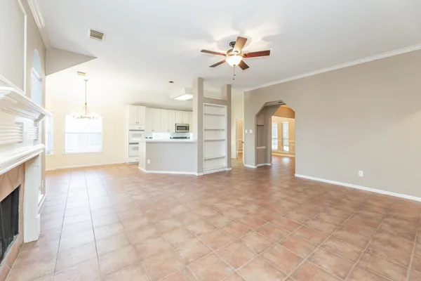 a view of a kitchen with a sink and a window