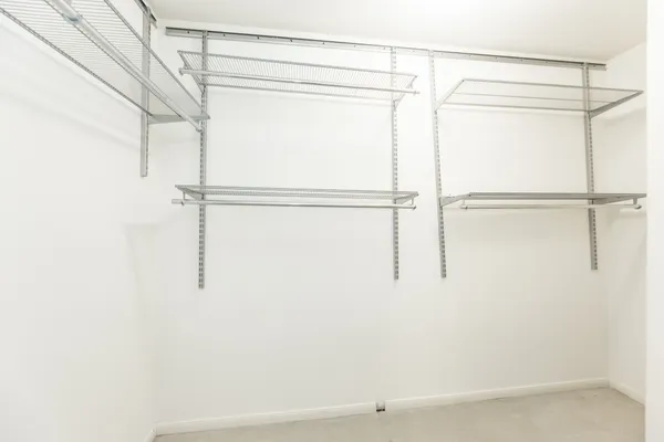 a view of room with window and ceiling fan