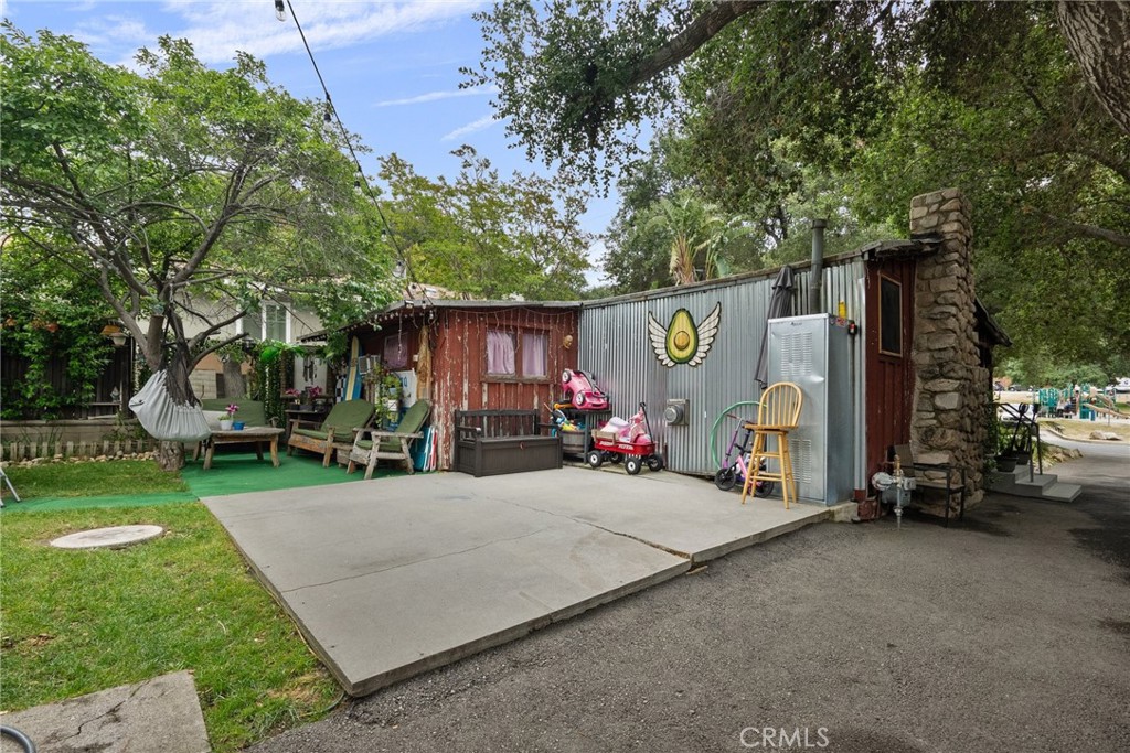 7553 McGroarty Street Tujunga, CA 91042 - Photo 24 of 26 a view of a house with a patio
