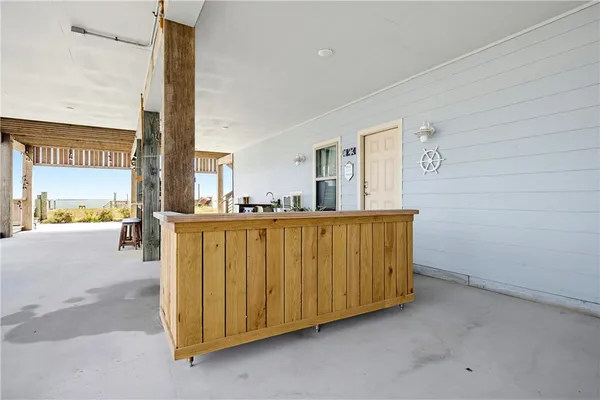 a view of a kitchen with a sink