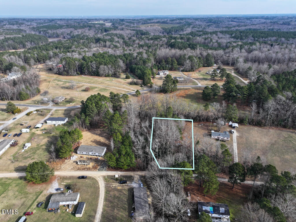 55 Spring Lane Henderson, NC 27537 - Photo 5 of 17 an aerial view of a house with a yard