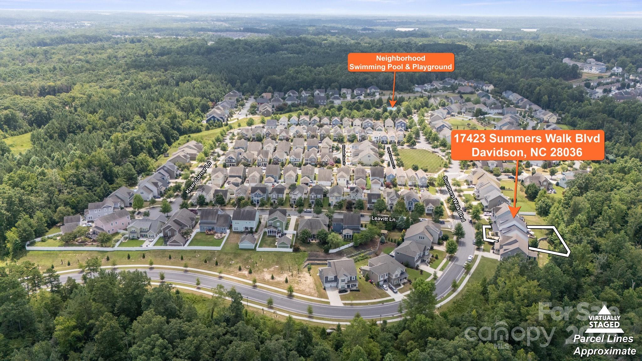 17423 Summers Walk Boulevard Davidson, NC 28036 - Photo 38 of 40 an aerial view of a house with a garden and lake view