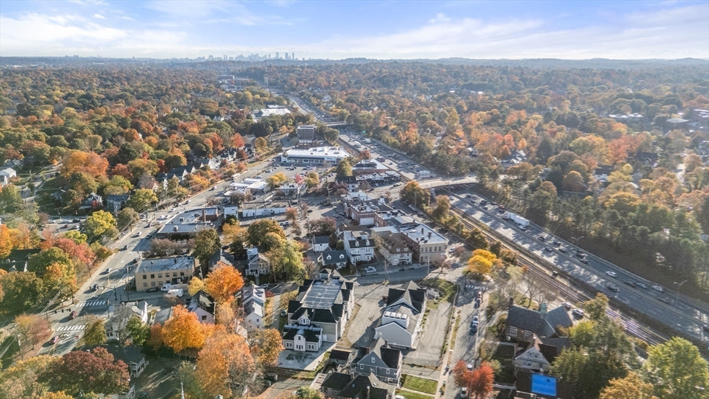 283 Melrose Street Newton, MA 02466 - Photo 18 of 18 an aerial view of residential building with parking space