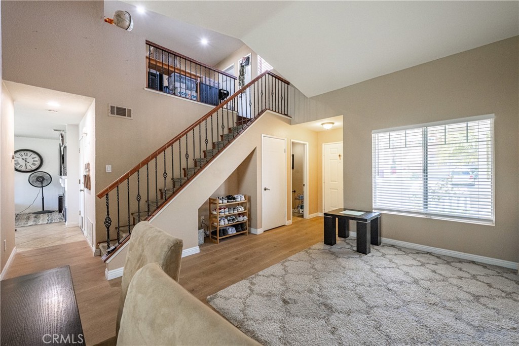 651 Viewpointe Lane Corona, CA 92881 - Photo 13 of 28 a view of entryway and hall with wooden floor