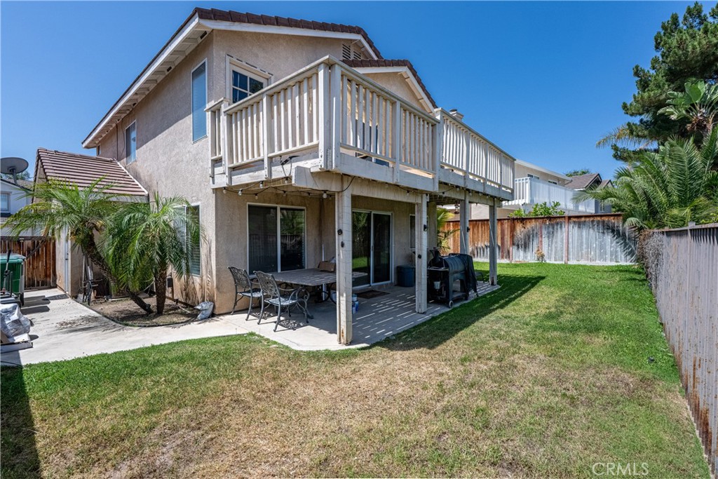 651 Viewpointe Lane Corona, CA 92881 - Photo 25 of 28 a view of a house with backyard porch and sitting area