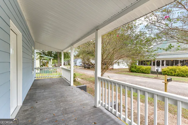 a view of a house with a porch