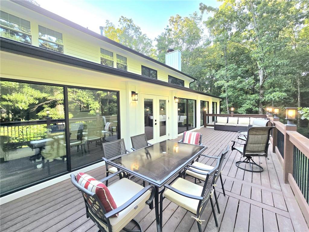 2900 Orchard Road Southwest Conyers, GA 30094 - Photo 34 of 63 a balcony with furniture and wooden floor