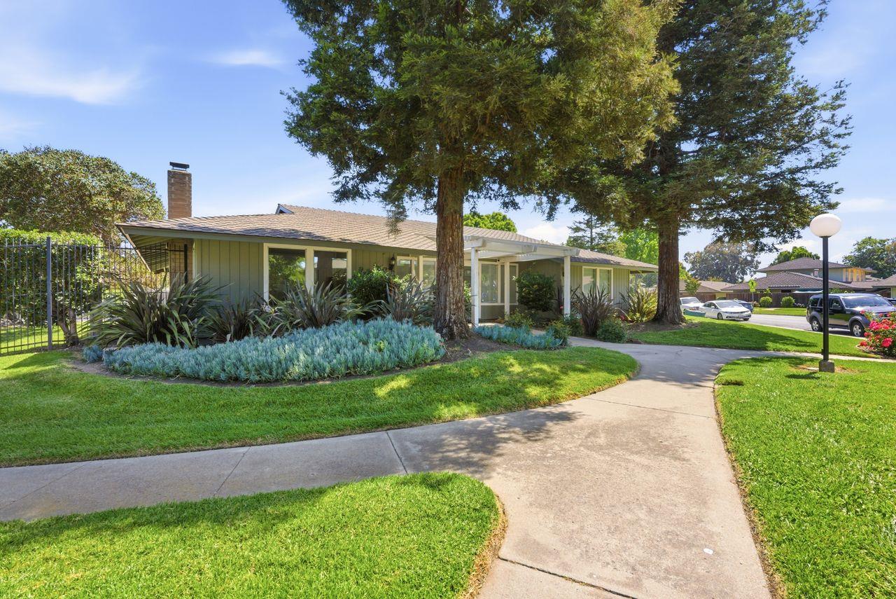 5561 Roundtree Common Fremont, CA 94538 - Photo 28 of 29 a front view of a house with a yard