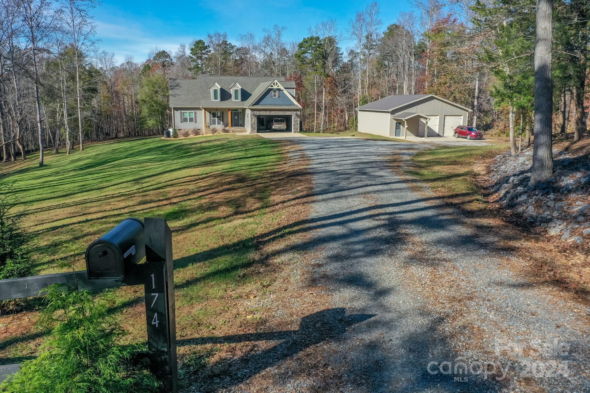 174 Spring Street Spindale, NC 28160 - Photo 1 of 30 a view of a house with a yard