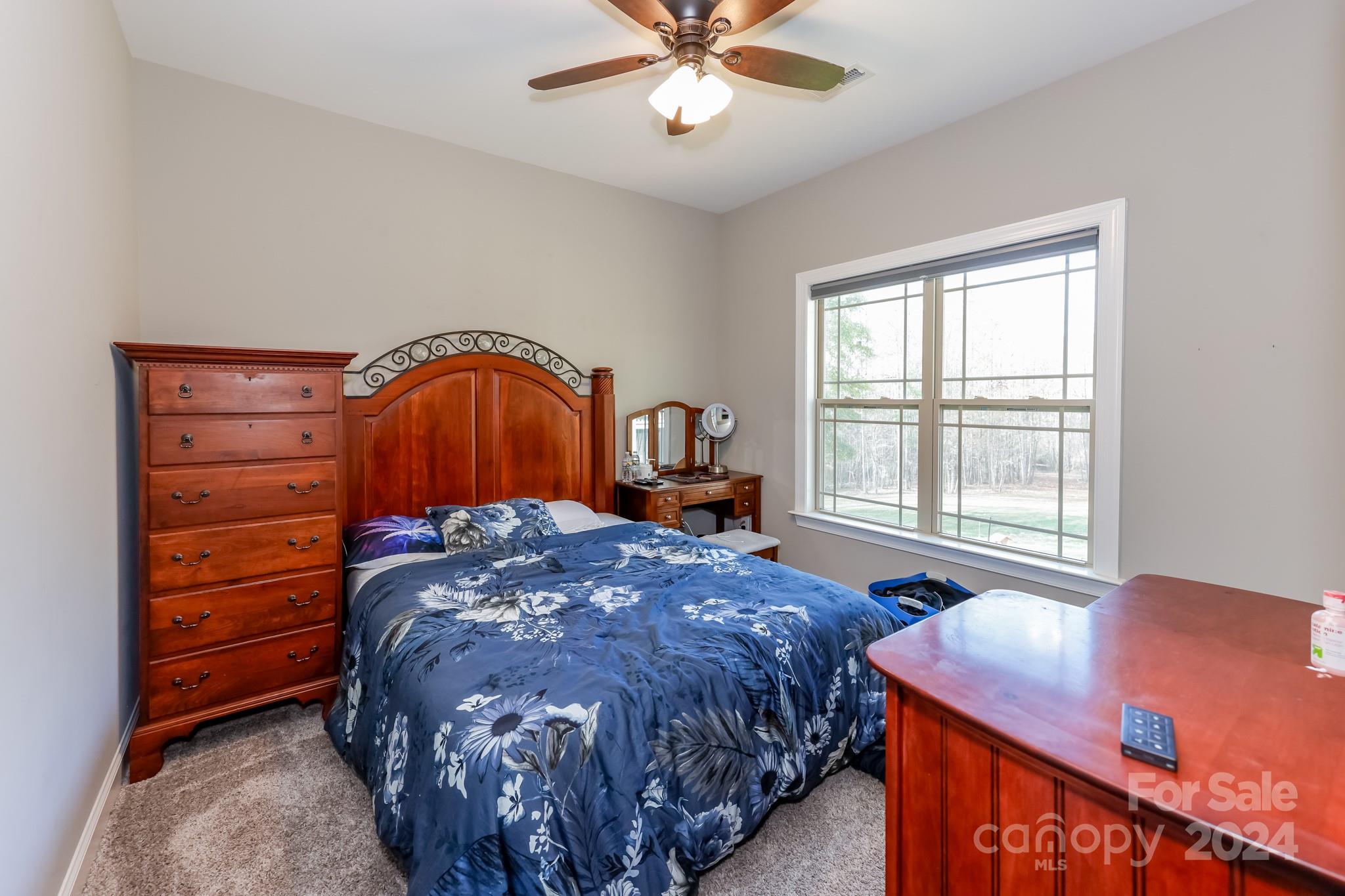174 Spring Street Spindale, NC 28160 - Photo 14 of 30 a bedroom with a bed and a window