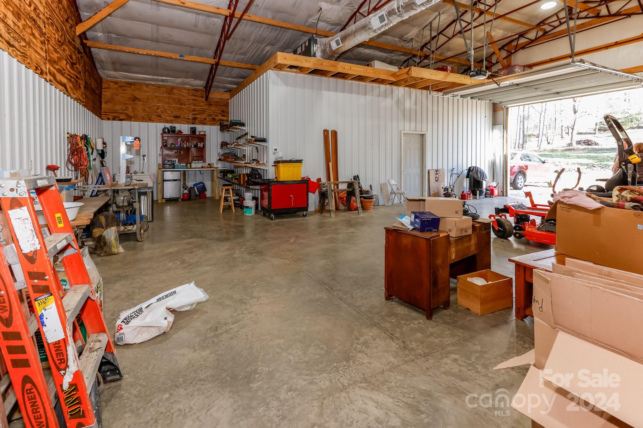 174 Spring Street Spindale, NC 28160 - Photo 25 of 30 a view of a storage room with a lot of stuff