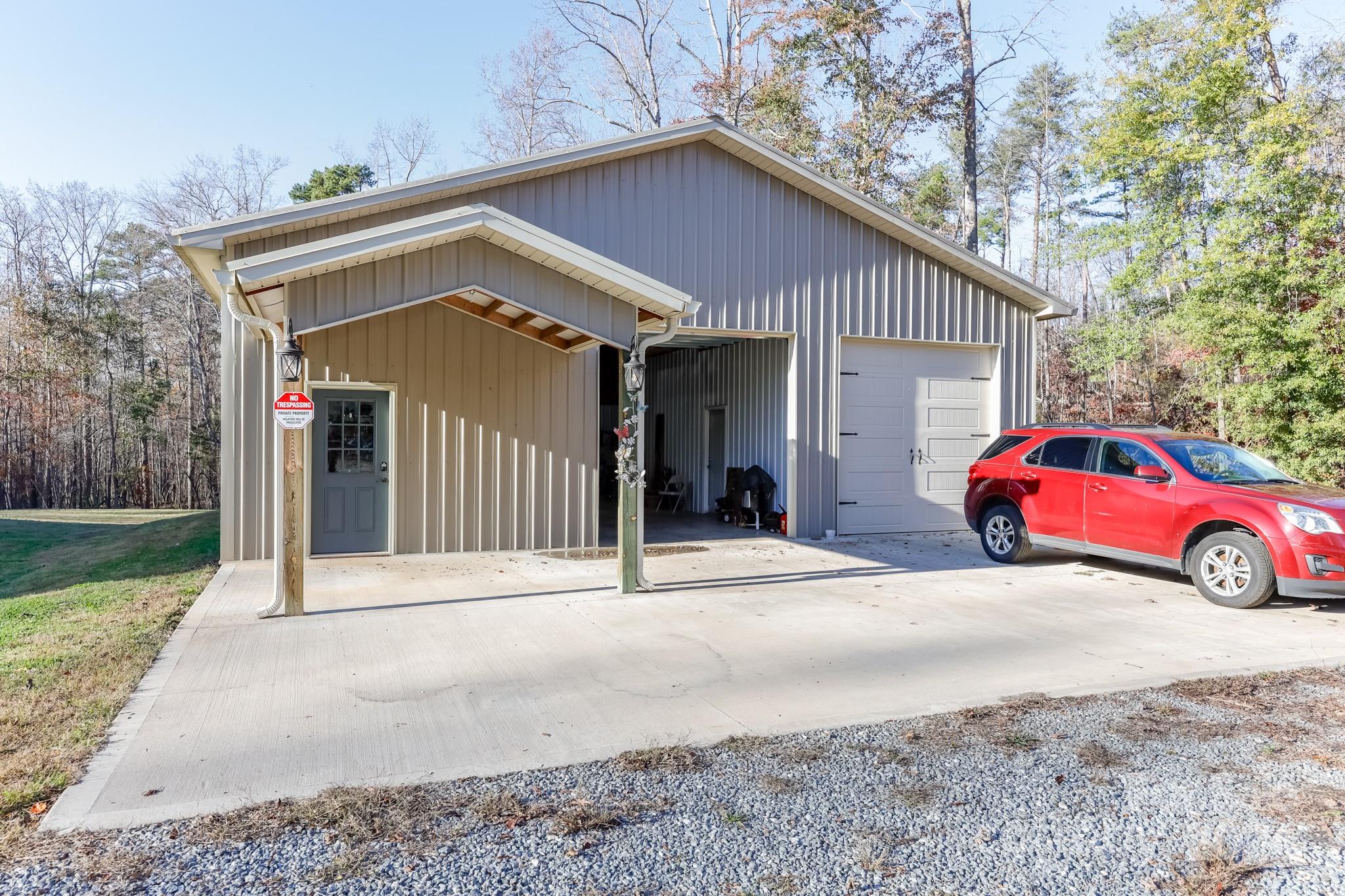 174 Spring Street Spindale, NC 28160 - Photo 28 of 30 a view of a car park in front of house