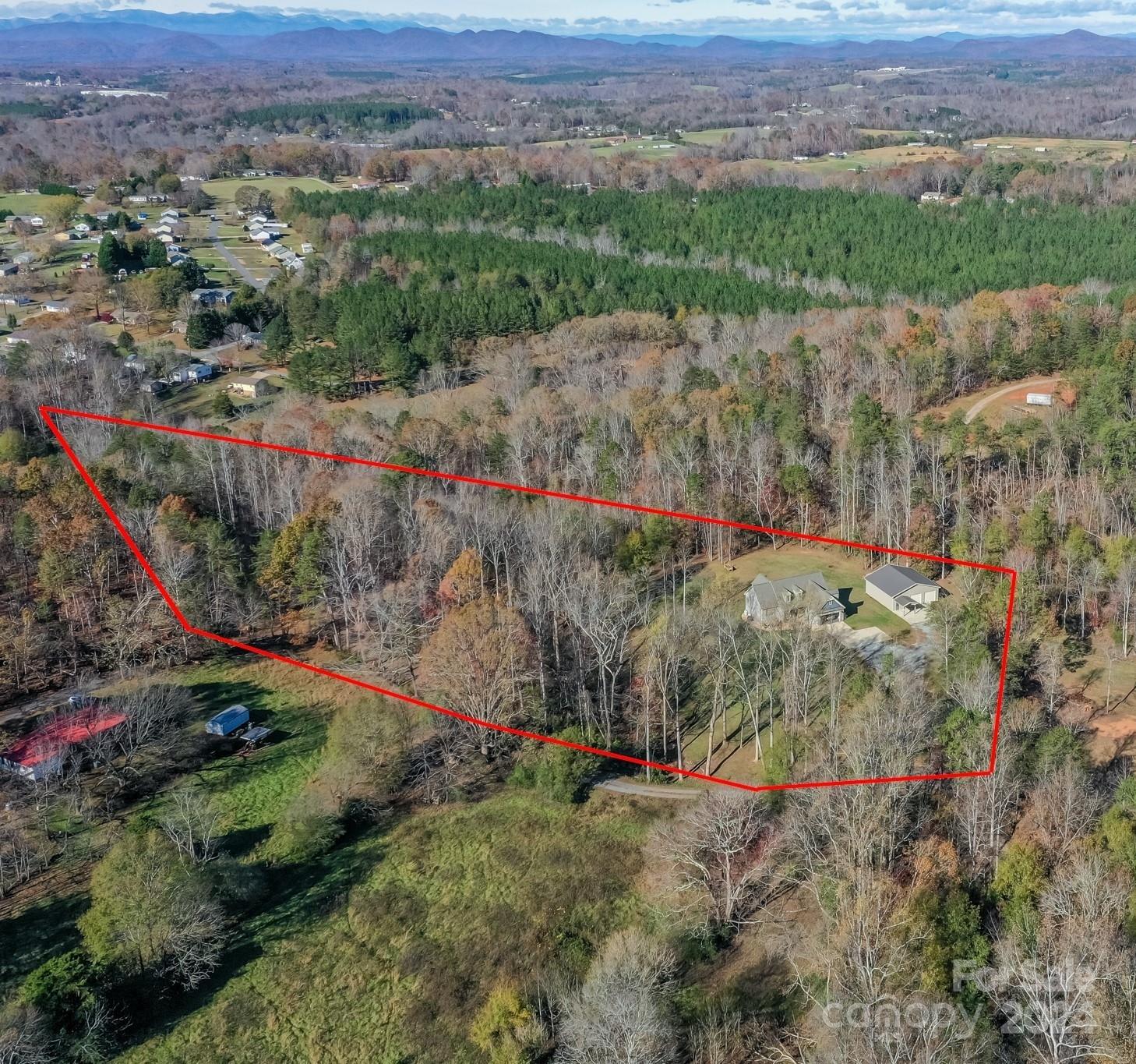 174 Spring Street Spindale, NC 28160 - Photo 30 of 30 an aerial view of a houses with a yard and mountain