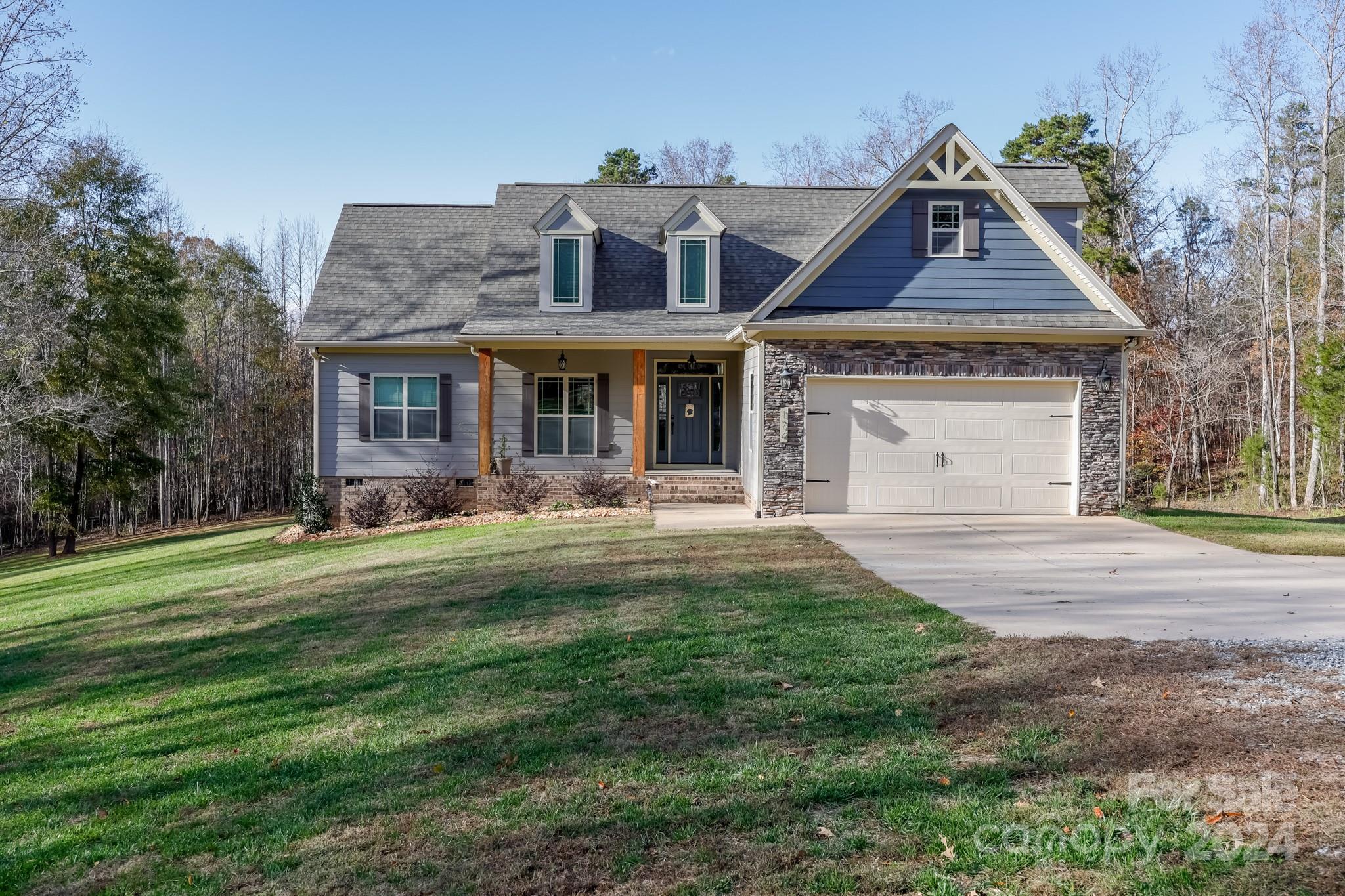174 Spring Street Spindale, NC 28160 - Photo 3 of 30 a front view of a house with a yard
