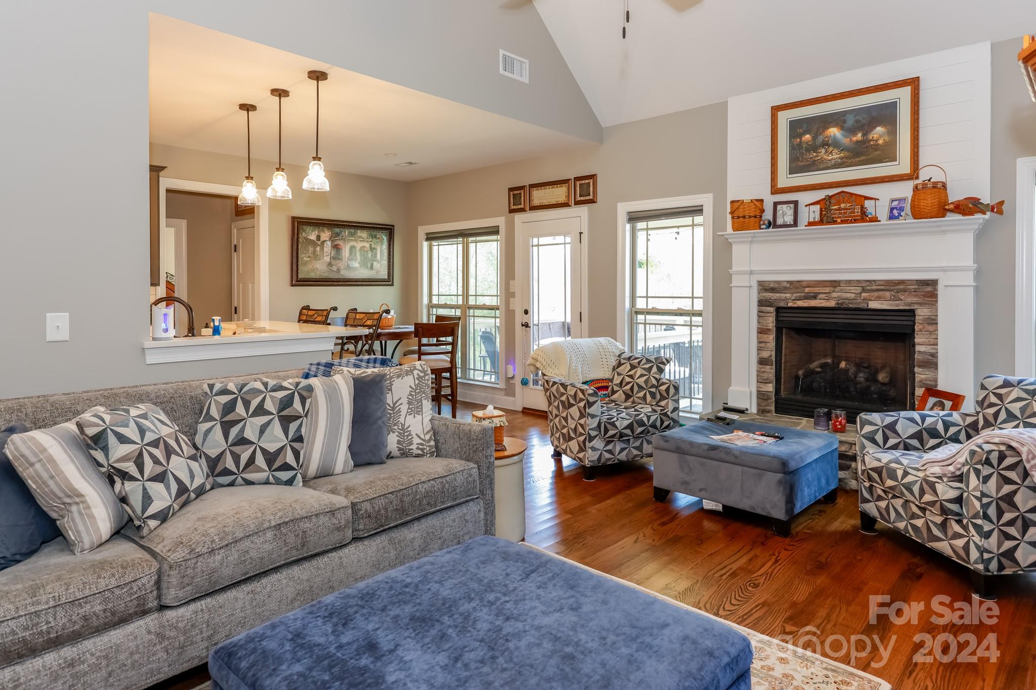 174 Spring Street Spindale, NC 28160 - Photo 5 of 30 a living room with furniture large window and a fireplace