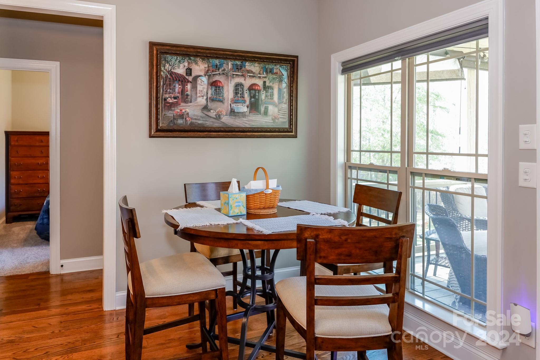 174 Spring Street Spindale, NC 28160 - Photo 6 of 30 a view of a dining room with furniture window and wooden floor