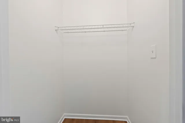 a view of small space with racks on the wall