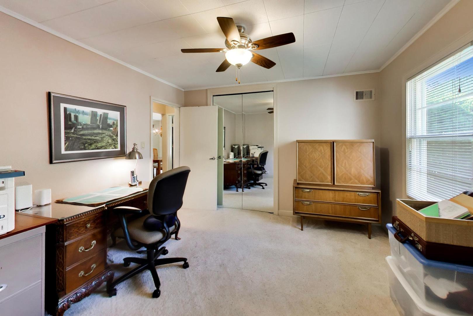 103 Cottonwood Road Northbrook, IL 60062 - Photo 17 of 50 a work room with furniture and gym equipment