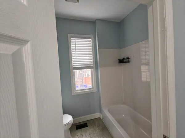 a bathroom with a bathtub