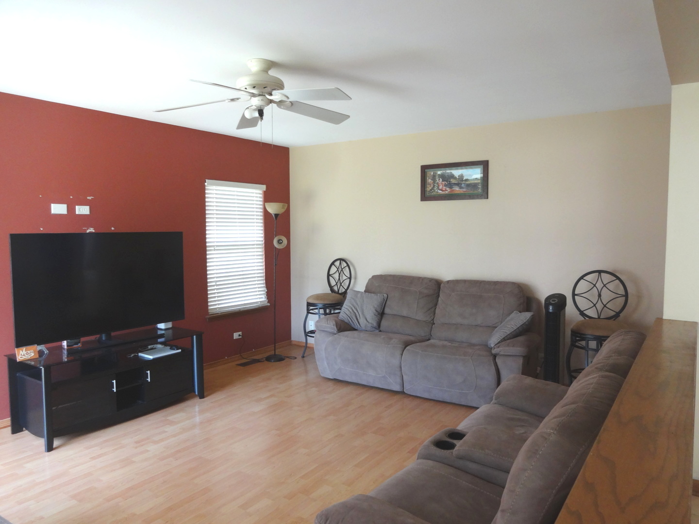 1340 Vernon Lane Bartlett, IL 60103 - Photo 11 of 24 a living room with furniture and a flat screen tv