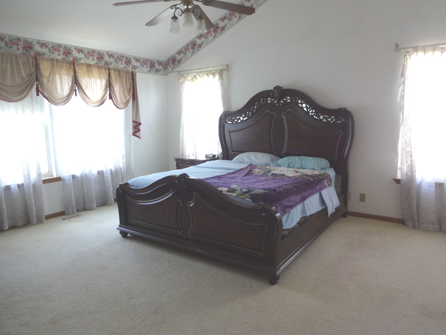 1340 Vernon Lane Bartlett, IL 60103 - Photo 14 of 24 a bedroom with a bed and a window