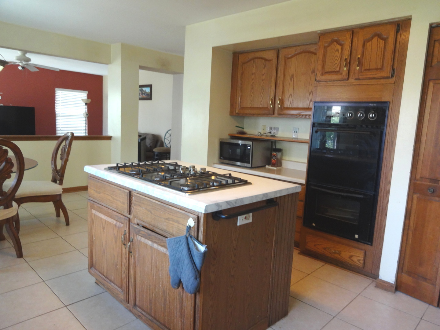 1340 Vernon Lane Bartlett, IL 60103 - Photo 7 of 24 a kitchen with a stove and a refrigerator