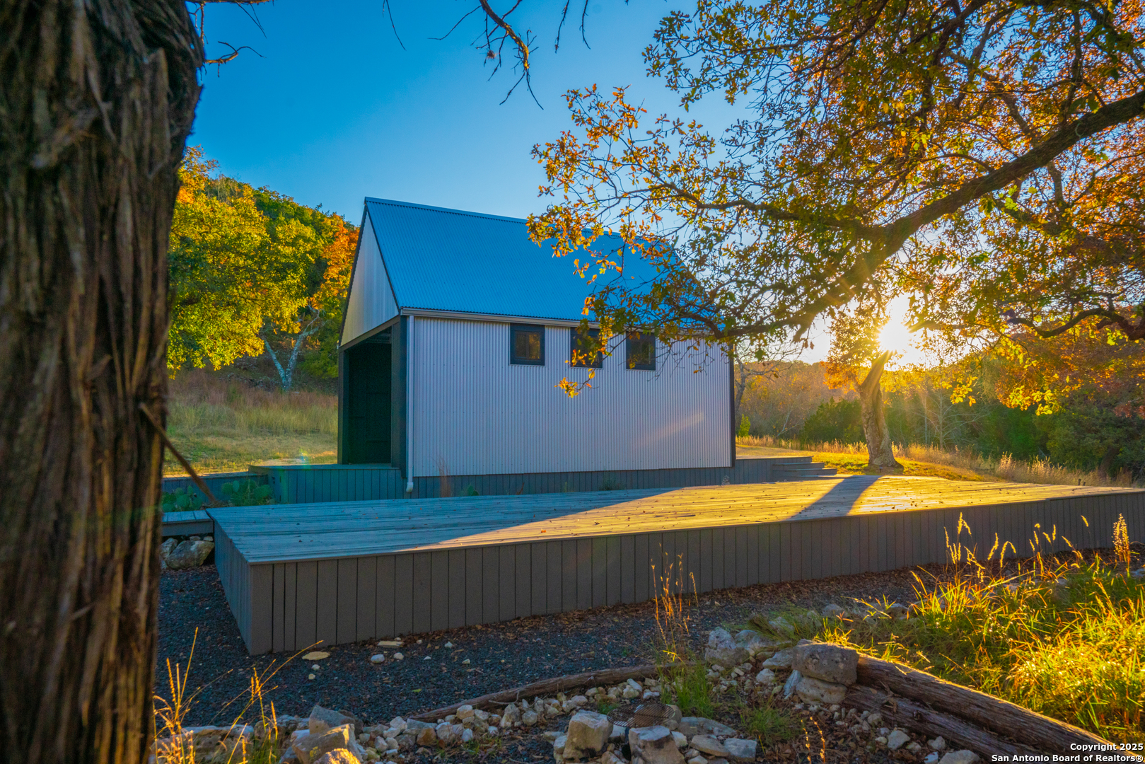 101 Bella Springs Road Boerne, TX 78006 - Photo 34 of 50 a view of a backyard with plants and a patio