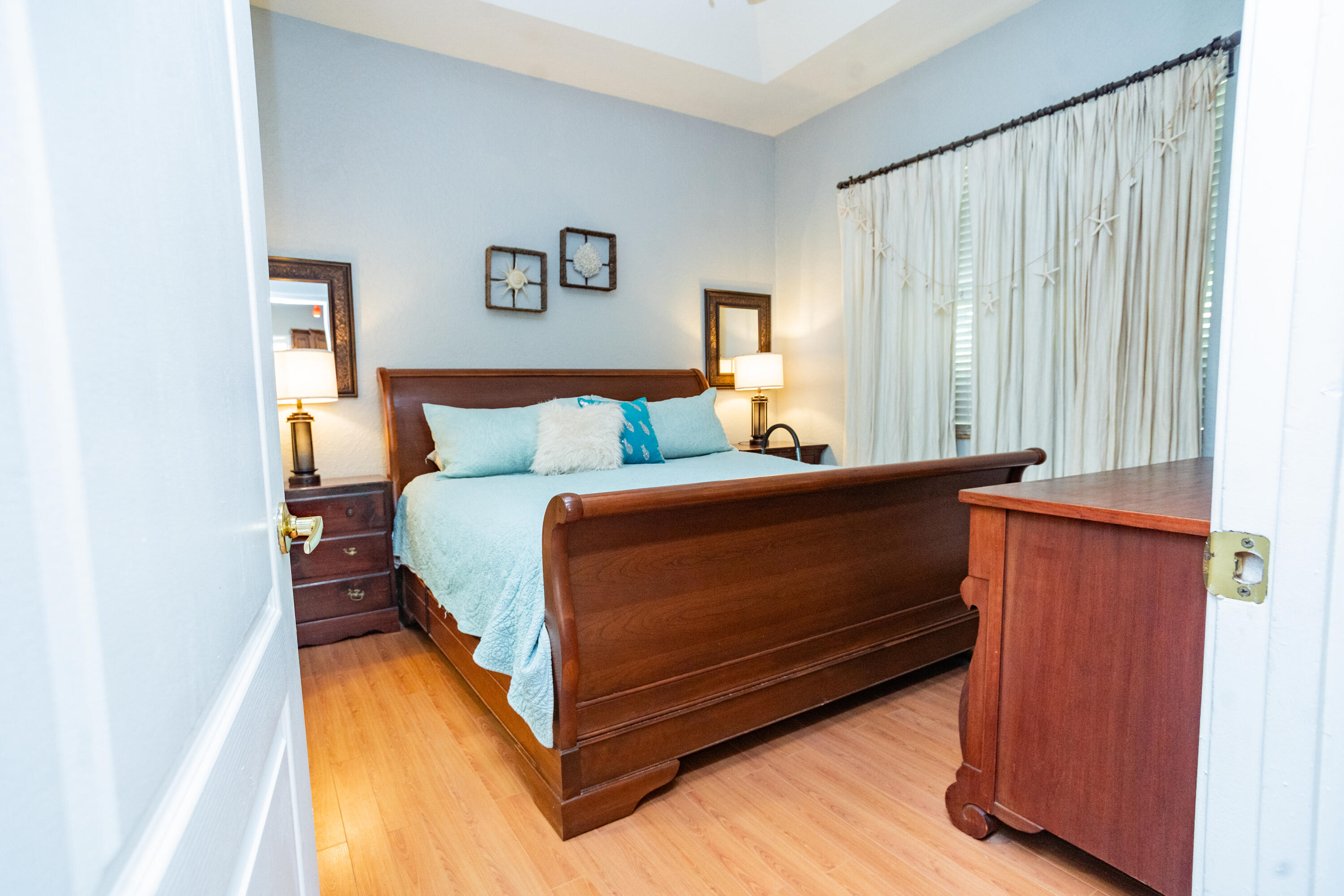 6020 Spring Lake Terrace Fort Pierce, FL 34951 - Photo 15 of 39 a bed room with a bed and a night stand