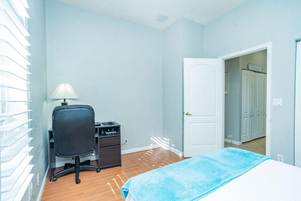 6020 Spring Lake Terrace Fort Pierce, FL 34951 - Photo 23 of 39 a workspace with furniture and a window