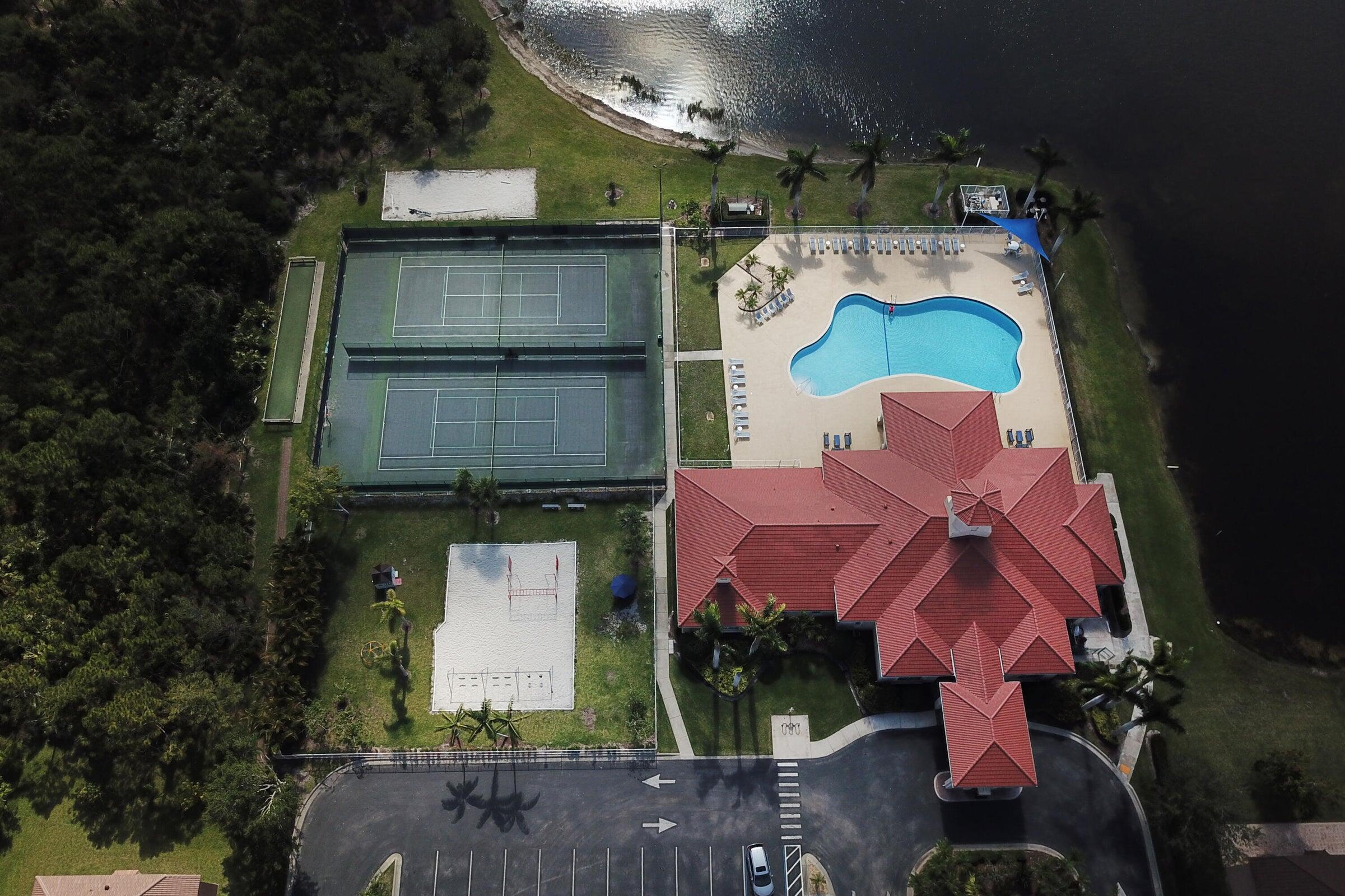 6020 Spring Lake Terrace Fort Pierce, FL 34951 - Photo 32 of 39 an aerial view of residential house with outdoor space and parking