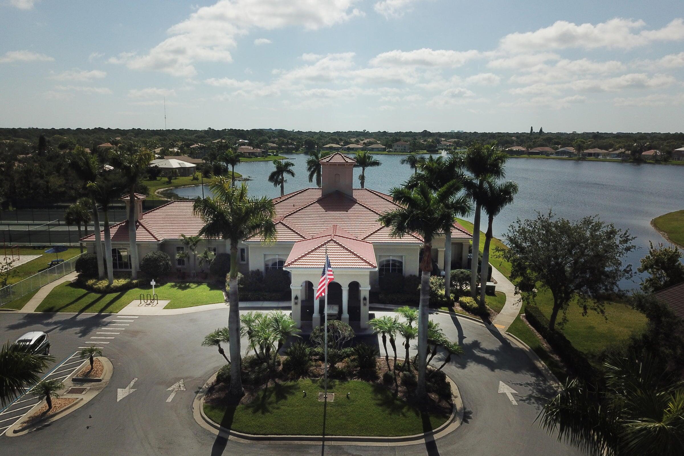 6020 Spring Lake Terrace Fort Pierce, FL 34951 - Photo 35 of 39 an aerial view of a house with yard lake and outdoor seating
