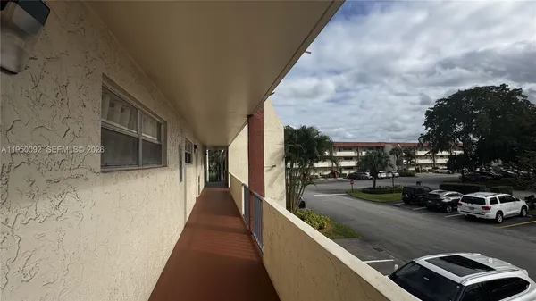 a view of a street with cars