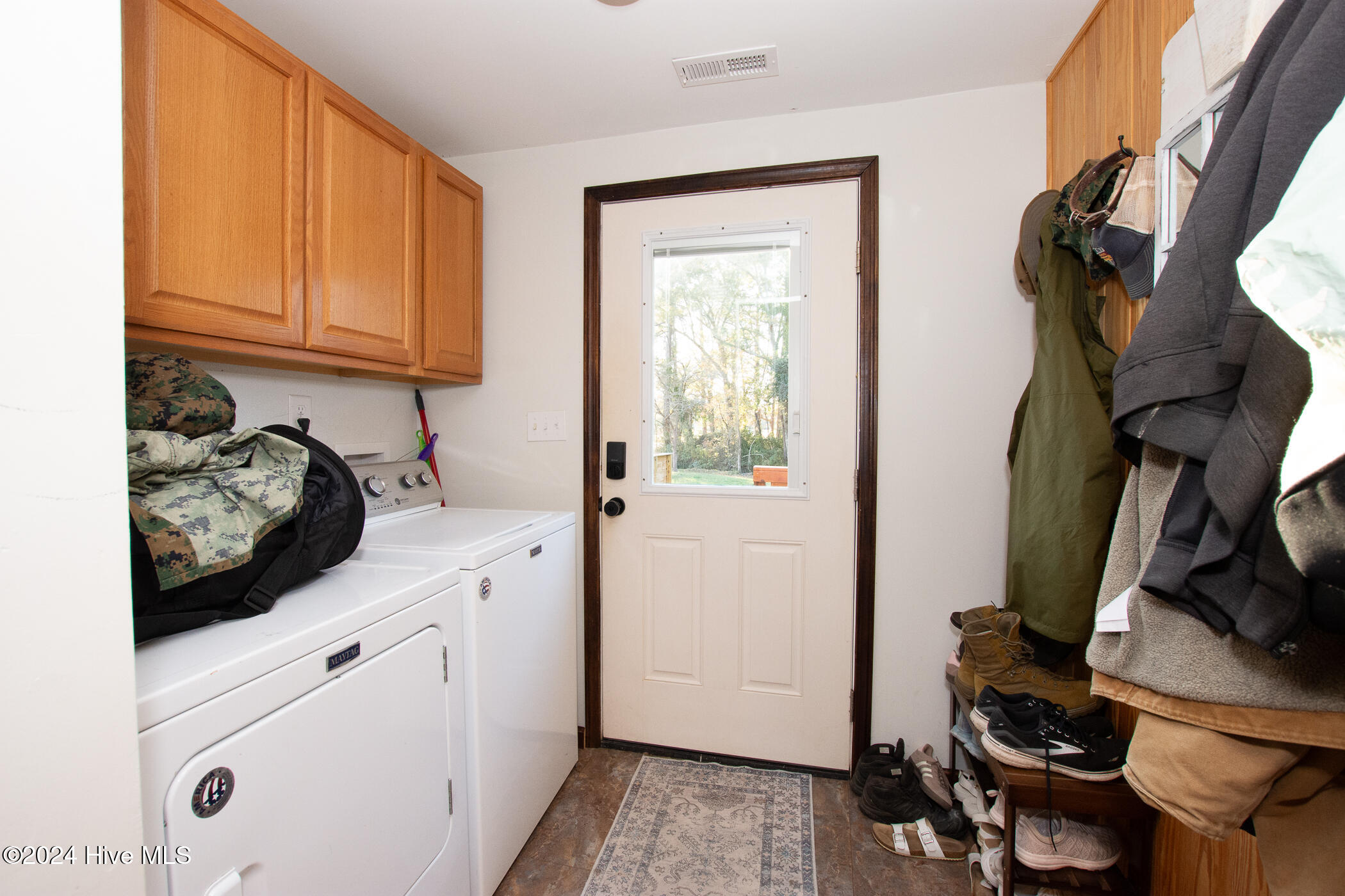 166 Verona Road Jacksonville, NC 28540 - Photo 37 of 52 Let's head to the backyard from the mudroom/laundry room