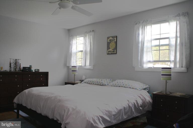 210 Margate Road Lutherville-Timonium, MD 21093 - Photo 13 of 19 Bright and airy master bedroom